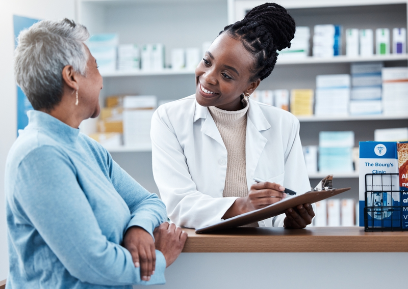 pharmacist talking with customer